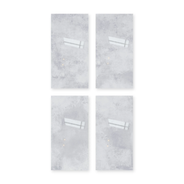 Cuatro placas de San Lorenzo Design Bauhaus Griggio 60x120 Pulido